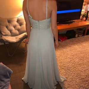 A turquoise prom dress